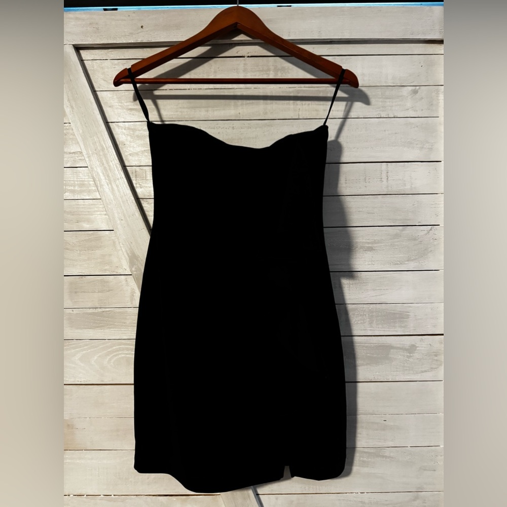 The limited black strapless dress Sz 6